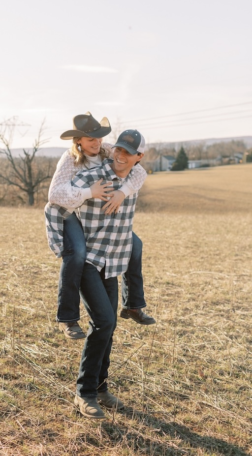 Josh giving Janelle a piggy back ride