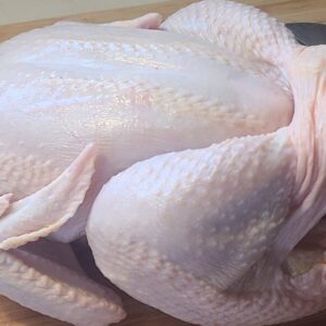 Whole chicken cleaned and dressed.