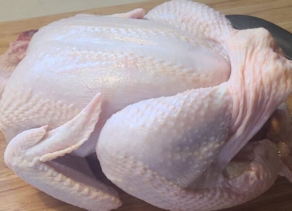 Whole chicken cleaned and dressed.